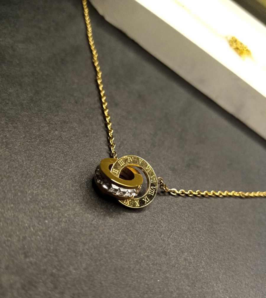 Interlocking Roman Numeral Ring Necklace